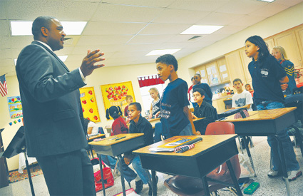 Guest speaker teaches fourth-graders about discipline, nature, attitude